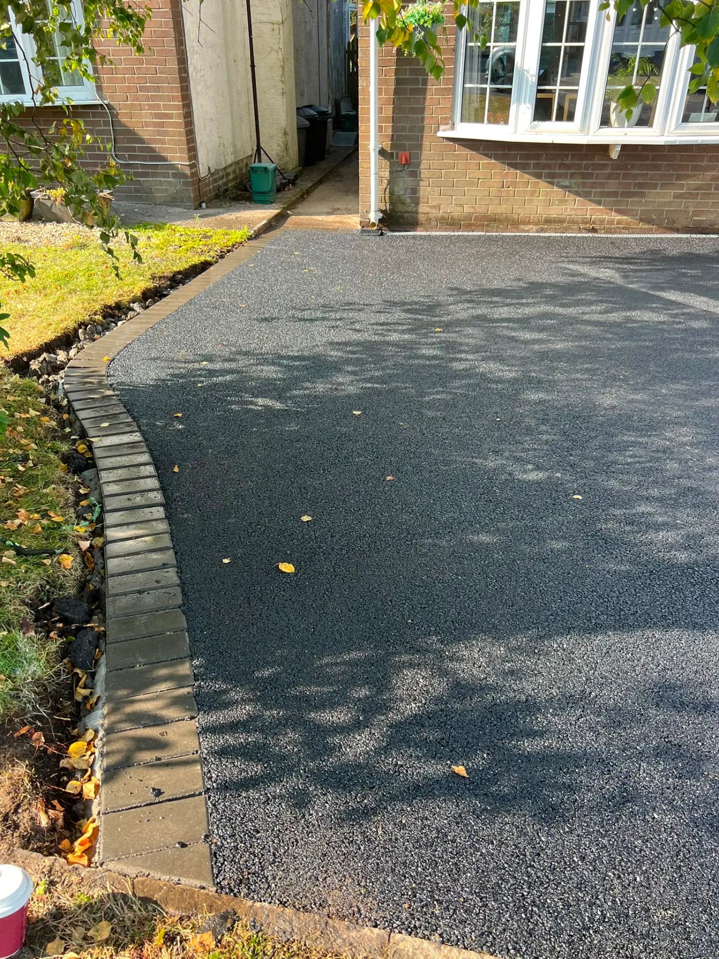 Tarmac driveway with block paved edging detail